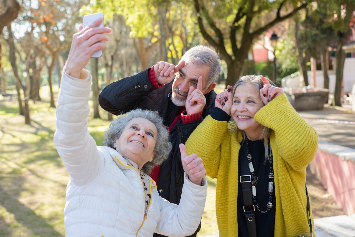 Elderly People Taking Group Selfie